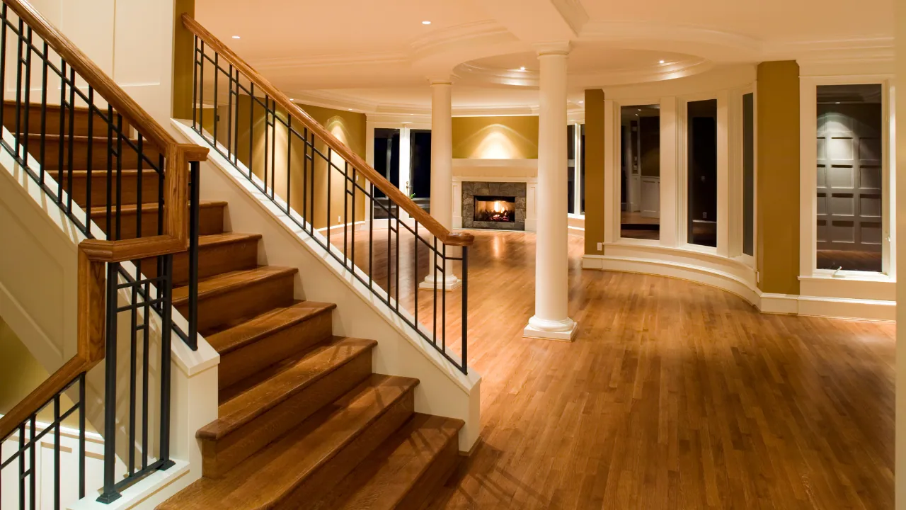 Hardwood staircase and matching living area in a Zionsville, IN home